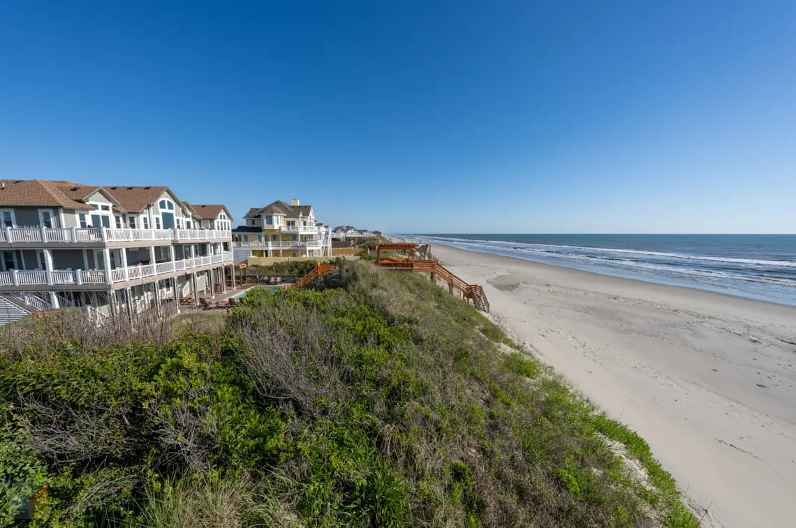Oceanfront homes on a dune above the beach on the Outer Banks of North Carolina